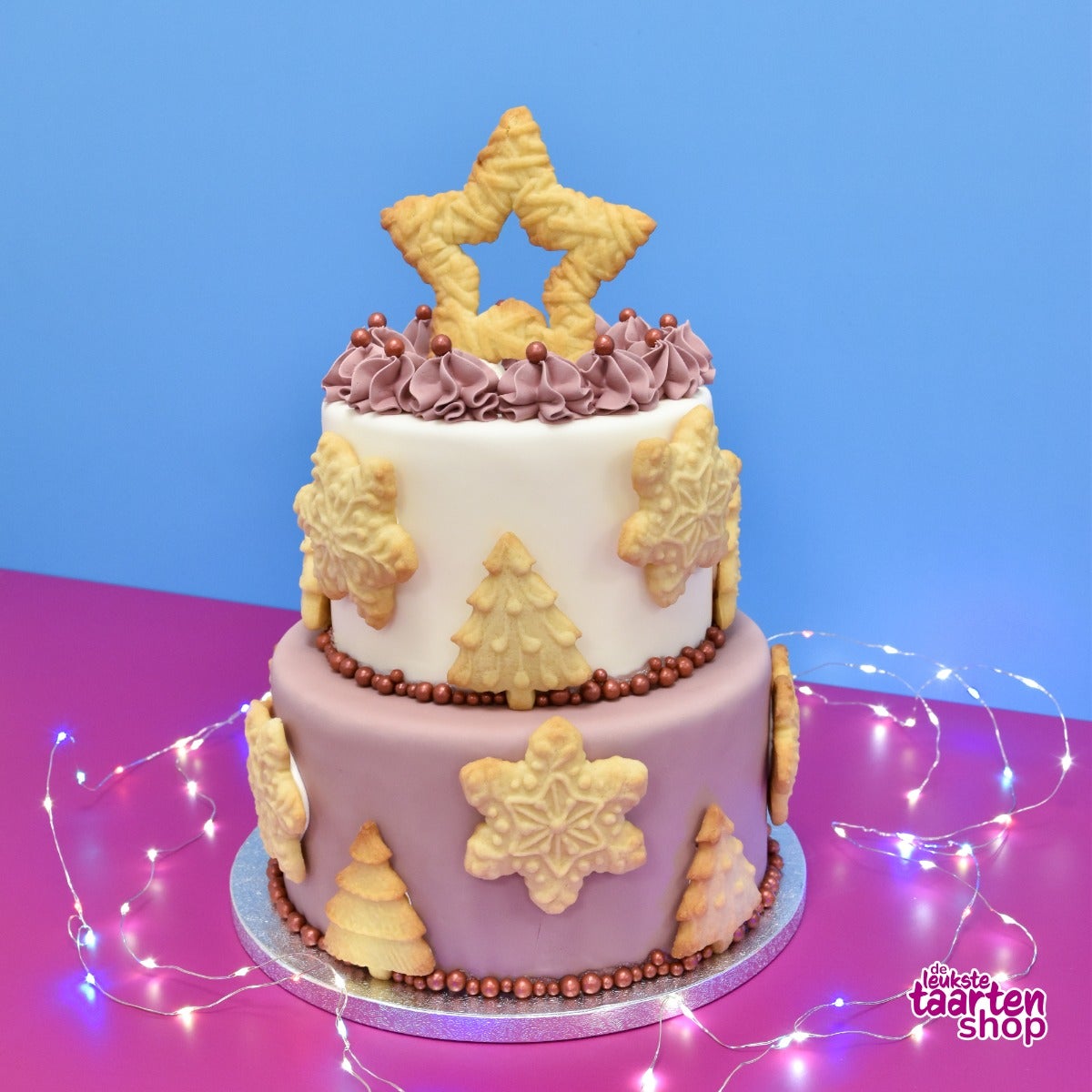 Festive Tiered Cake with Christmas Cookies and Cinnamon