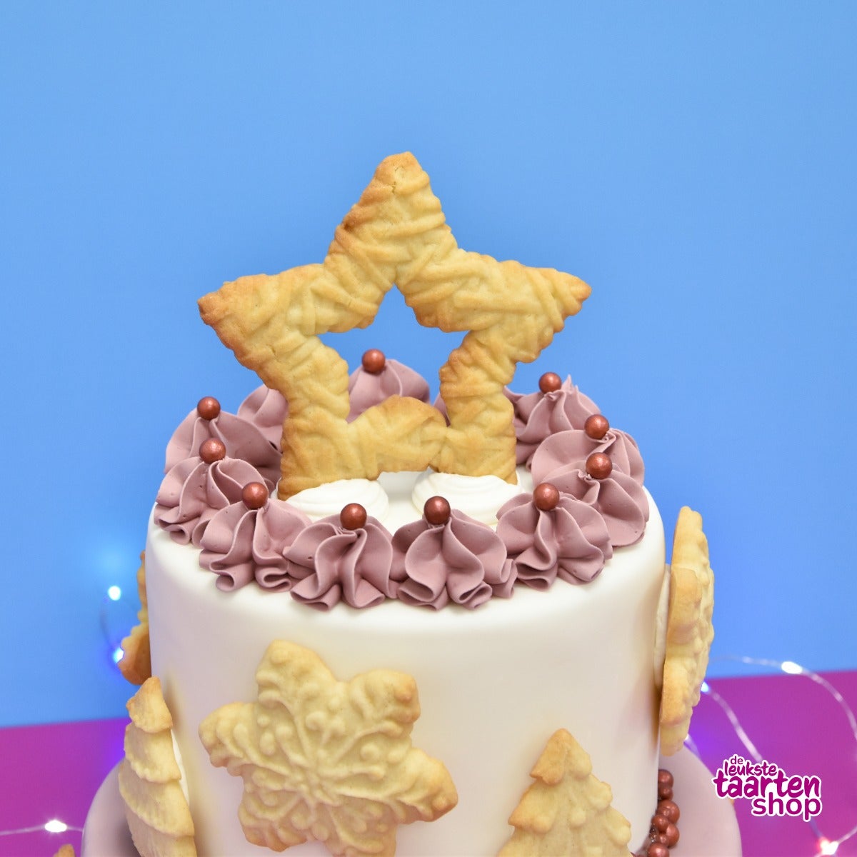 Festive Tiered Cake with Christmas Cookies and Cinnamon