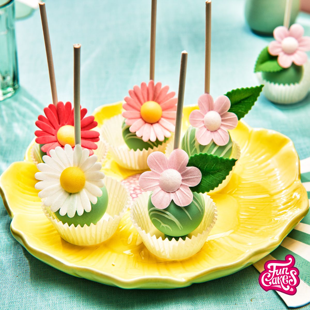 Green summer cakepops with flowers