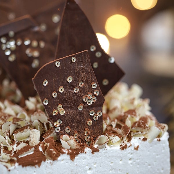 Festive tiramisu cake with white chocolate mousse