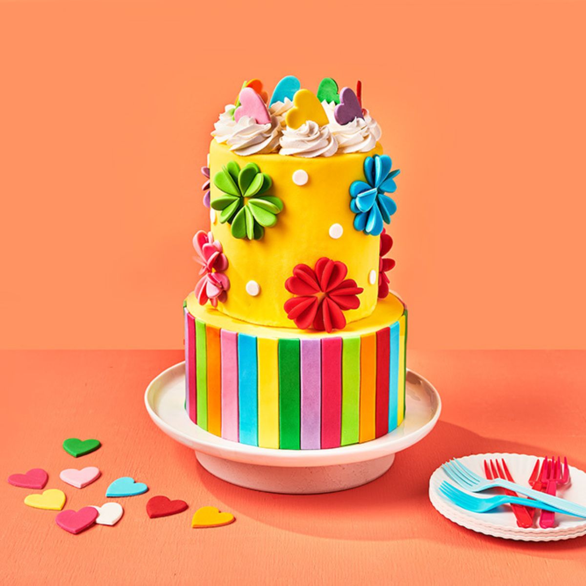 Tiered cake with 3D flowers and stripes